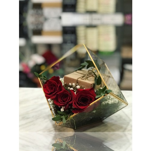 glass case with forever roses